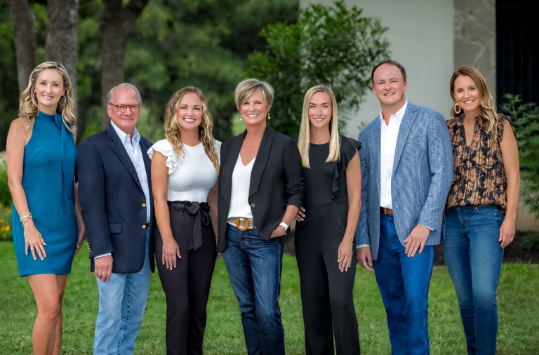 Saunders Luxury Group team photo outdoors